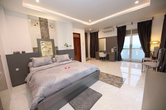 Imagen de la habitación del Hotel Villa Buah. Foto 16