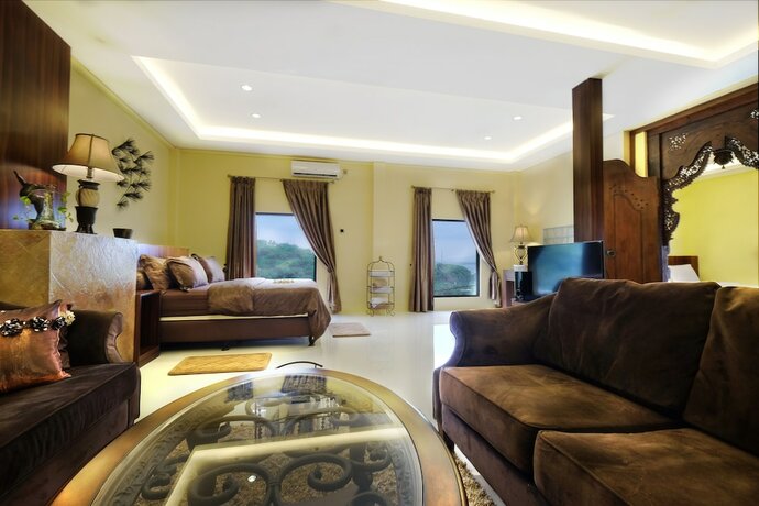 Imagen de la habitación del Hotel Villa Buah. Foto 17