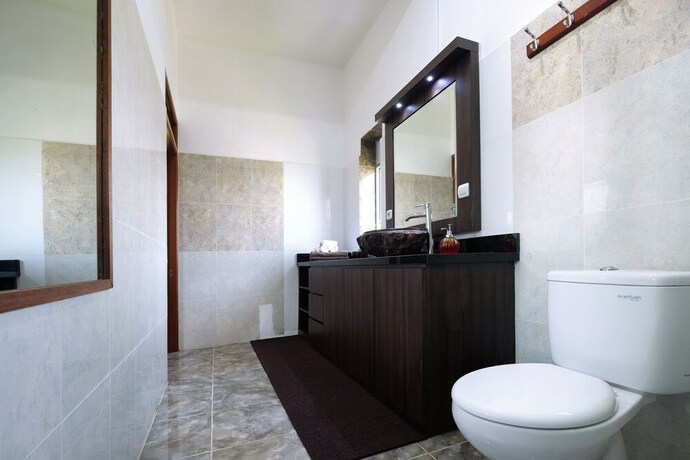 Imagen de la habitación del Hotel Villa Buah. Foto 24