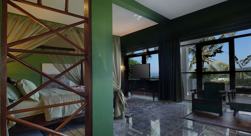 Imagen de la habitación del Hotel Villa Buah. Foto 25
