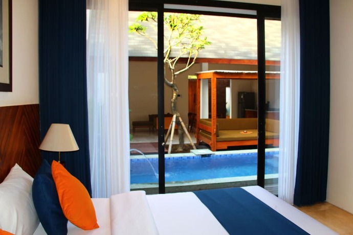Imagen de la habitación del Hotel Villa Bulan Bali. Foto 15