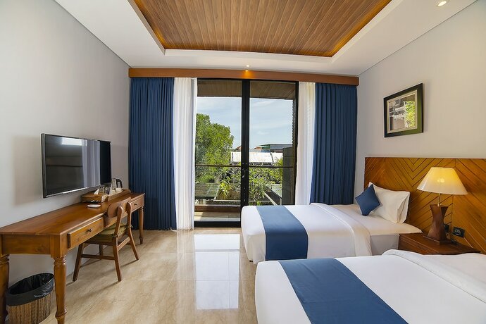 Imagen de la habitación del Hotel Villa Bulan Bali. Foto 17