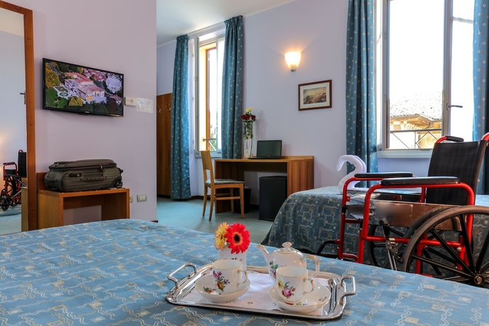 Imagen de la habitación del Hotel Villa Cagnola. Foto 13