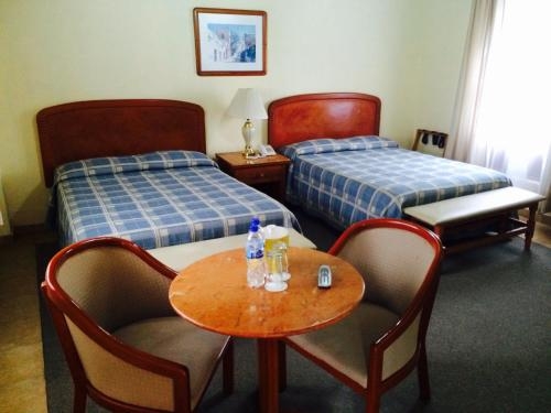 Imagen de la habitación del Hotel Villa Caltengo. Foto 7