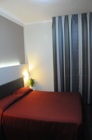 Imagen de la habitación del Hotel Villa Camilla. Foto 11