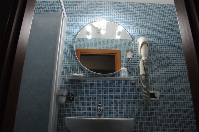 Imagen de la habitación del Hotel Villa Camilla. Foto 15
