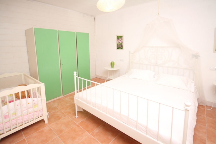 Imagen de la habitación del Hotel Villa Can Antonia Dotze. Foto 11