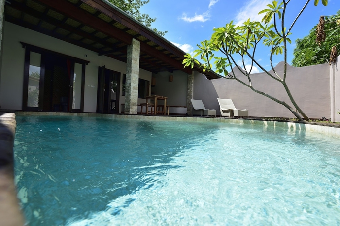 Imagen de la habitación del Hotel Villa Cantika Resort. Foto 2
