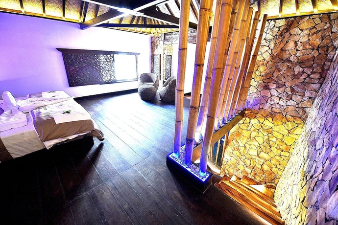 Imagen de la habitación del Hotel Villa Cantika Resort. Foto 5