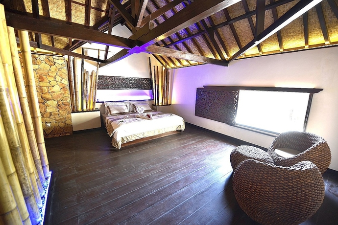 Imagen de la habitación del Hotel Villa Cantika Resort. Foto 6