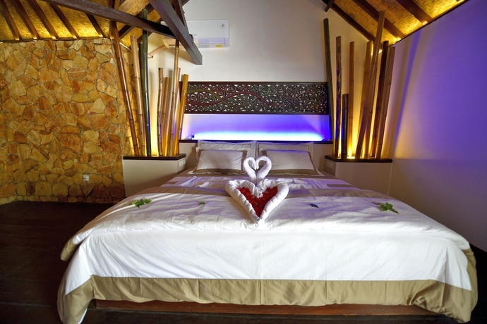 Imagen de la habitación del Hotel Villa Cantika Resort. Foto 7