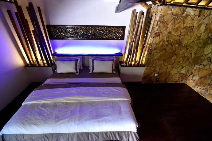 Imagen de la habitación del Hotel Villa Cantika Resort. Foto 8