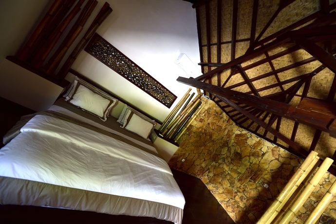 Imagen de la habitación del Hotel Villa Cantika Resort. Foto 9