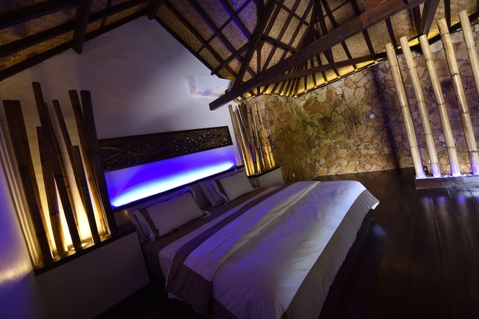 Imagen de la habitación del Hotel Villa Cantika Resort. Foto 10