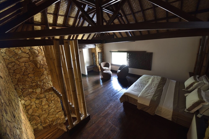 Imagen de la habitación del Hotel Villa Cantika Resort. Foto 11