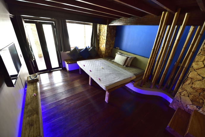 Imagen de la habitación del Hotel Villa Cantika Resort. Foto 14