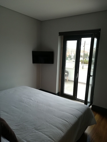 Imagen de la habitación del Hotel Villa Caparica Hostel. Foto 9