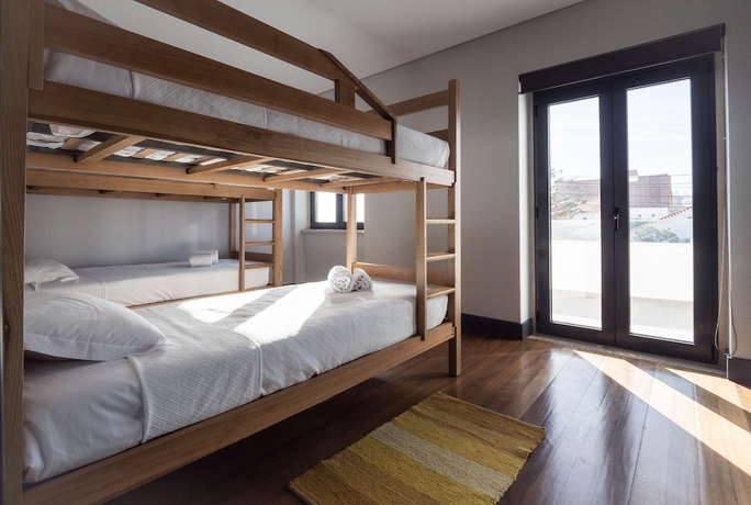 Imagen de la habitación del Hotel Villa Caparica Hostel. Foto 12