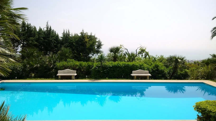 Imagen de la piscina del Hotel Villa Capodarco Bandb. Foto 12