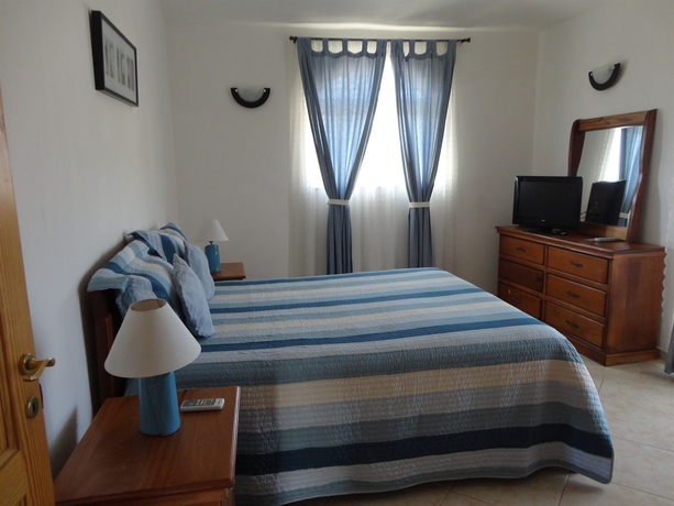 Imagen de la habitación del Hotel Villa Capri Salon and Spa. Foto 5