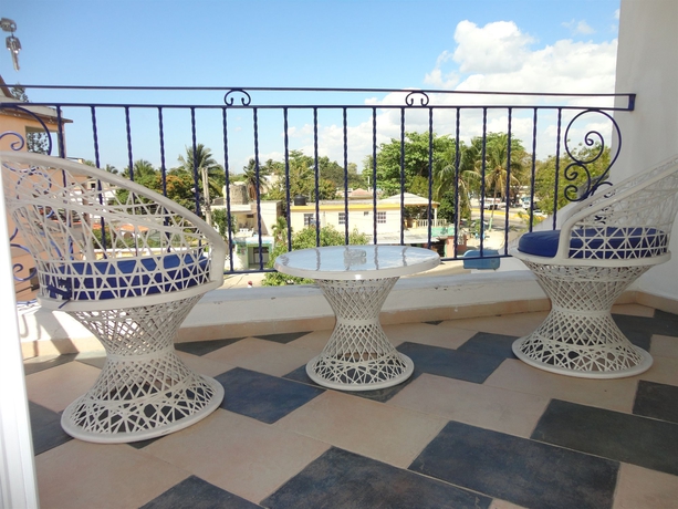 Imagen de la habitación del Hotel Villa Capri Salon and Spa. Foto 6