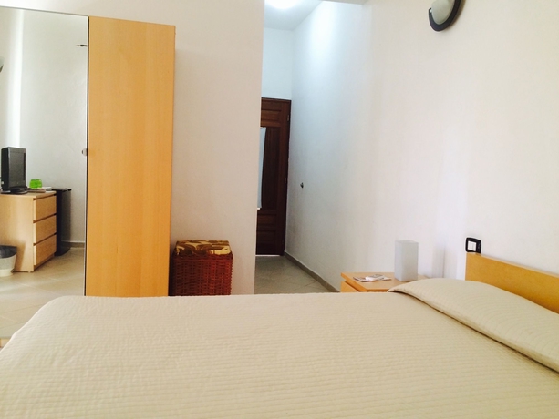 Imagen de la habitación del Hotel Villa Capri Salon and Spa. Foto 7