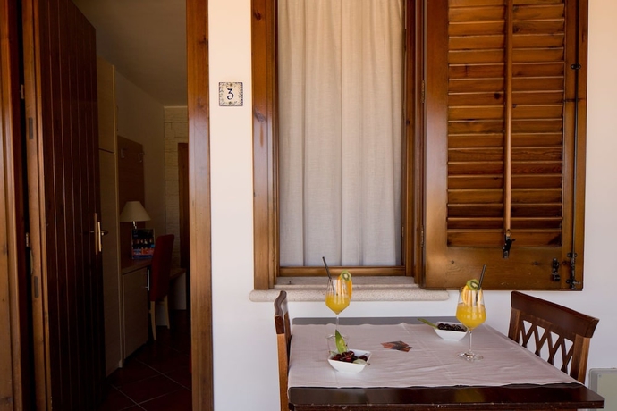 Imagen de la habitación del Hotel Villa Carlo Resort. Foto 14