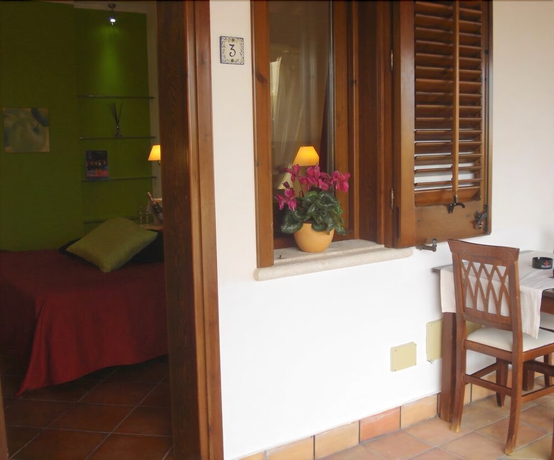 Imagen de la habitación del Hotel Villa Carlo Resort. Foto 19