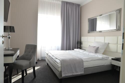 Imagen de la habitación del Hotel Villa Casino. Foto 8