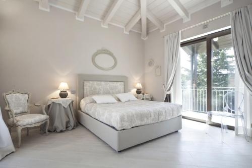 Imagen de la habitación del Hotel Villa Castelletto. Foto 10