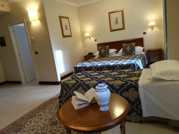 Imagen de la habitación del Hotel Villa Cattani Stuart Xvii Secolo. Foto 17