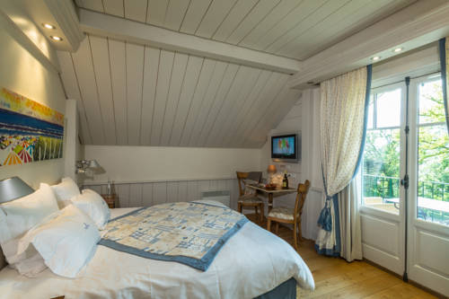 Imagen de la habitación del Hotel Villa Cécile. Foto 4