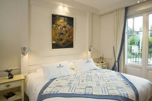 Imagen de la habitación del Hotel Villa Cécile. Foto 7