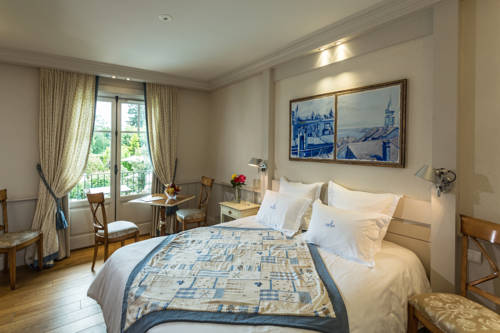 Imagen de la habitación del Hotel Villa Cécile. Foto 11