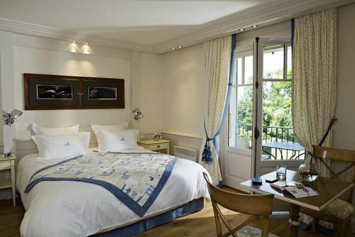 Imagen de la habitación del Hotel Villa Cécile. Foto 13