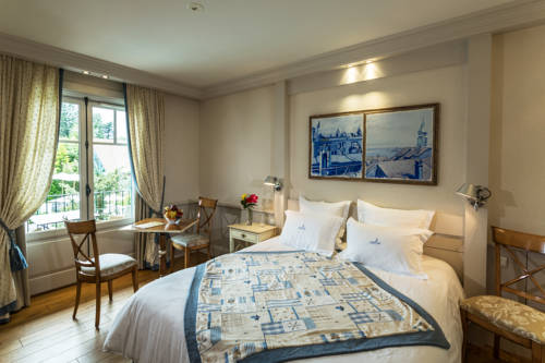 Imagen de la habitación del Hotel Villa Cécile. Foto 16