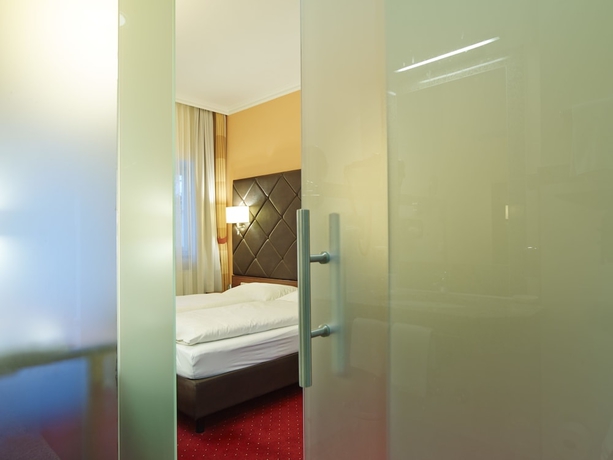 Imagen de la habitación del Hotel Villa Ceconi by Das Grüne Hotel zur Post. Foto 7