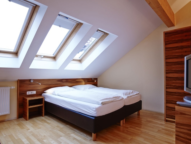 Imagen de la habitación del Hotel Villa Ceconi by Das Grüne Hotel zur Post. Foto 16