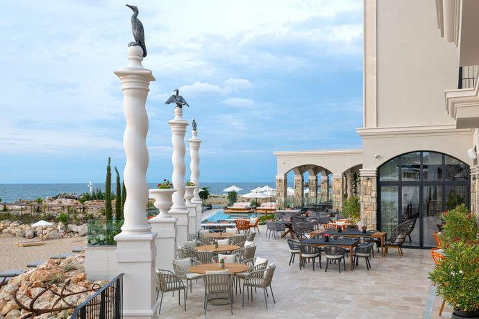 Imagen del bar/restaurante del Hotel Villa Chinka by Astor Garden Hotel. Foto 5