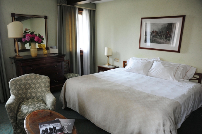 Imagen de la habitación del Hotel Villa Cipriani. Foto 12