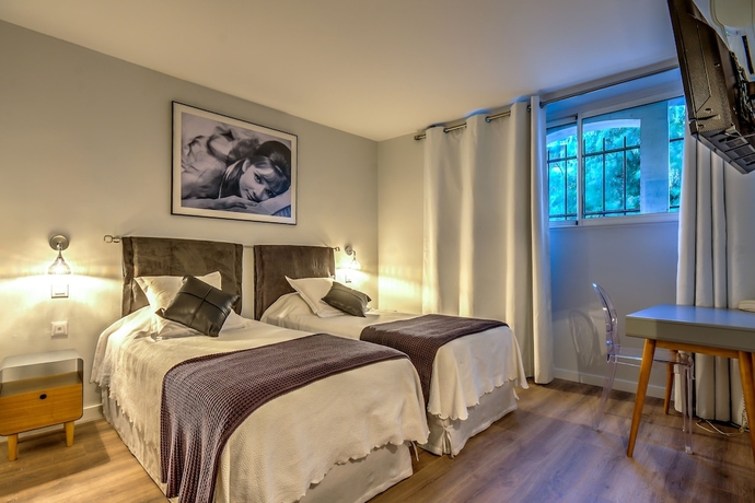 Imagen de la habitación del Hotel Villa Claudia. Foto 5