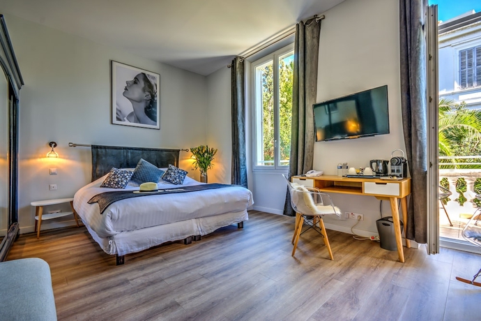 Imagen de la habitación del Hotel Villa Claudia. Foto 8