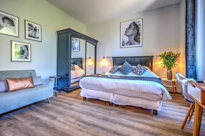 Imagen de la habitación del Hotel Villa Claudia. Foto 9