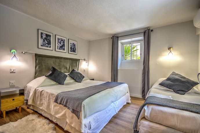 Imagen de la habitación del Hotel Villa Claudia. Foto 11