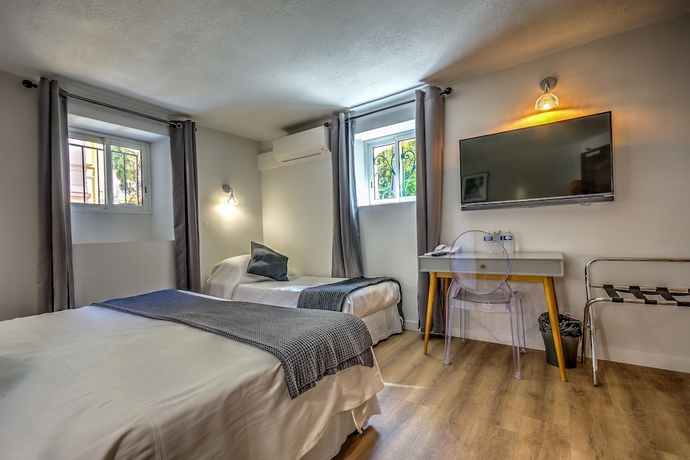 Imagen de la habitación del Hotel Villa Claudia. Foto 13