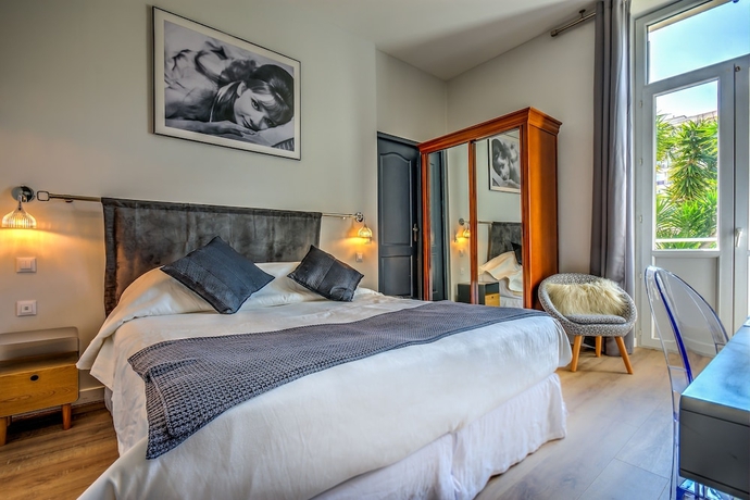 Imagen de la habitación del Hotel Villa Claudia. Foto 15