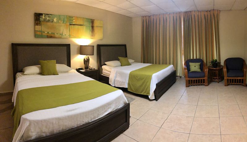 Imagen de la habitación del Hotel Villa Cofresi. Foto 14