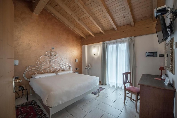 Imagen de la habitación del Hotel Villa Colico. Foto 5