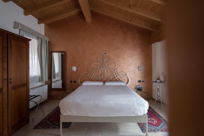 Imagen de la habitación del Hotel Villa Colico. Foto 6