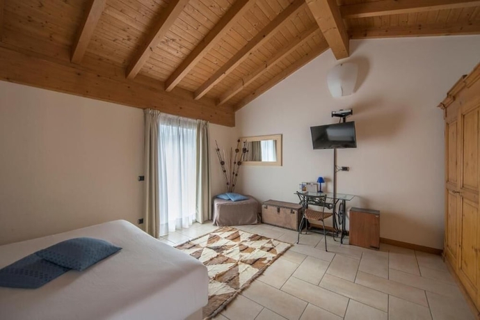 Imagen de la habitación del Hotel Villa Colico. Foto 7